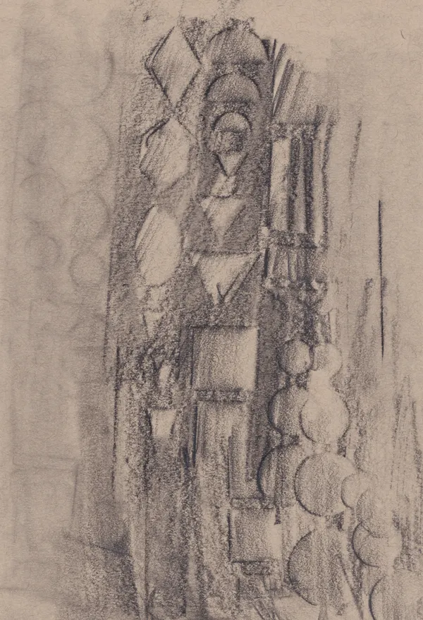Charcoal rubbing on brown paper: a band of blocks, triangles and half-circles running down the sheet like a frieze