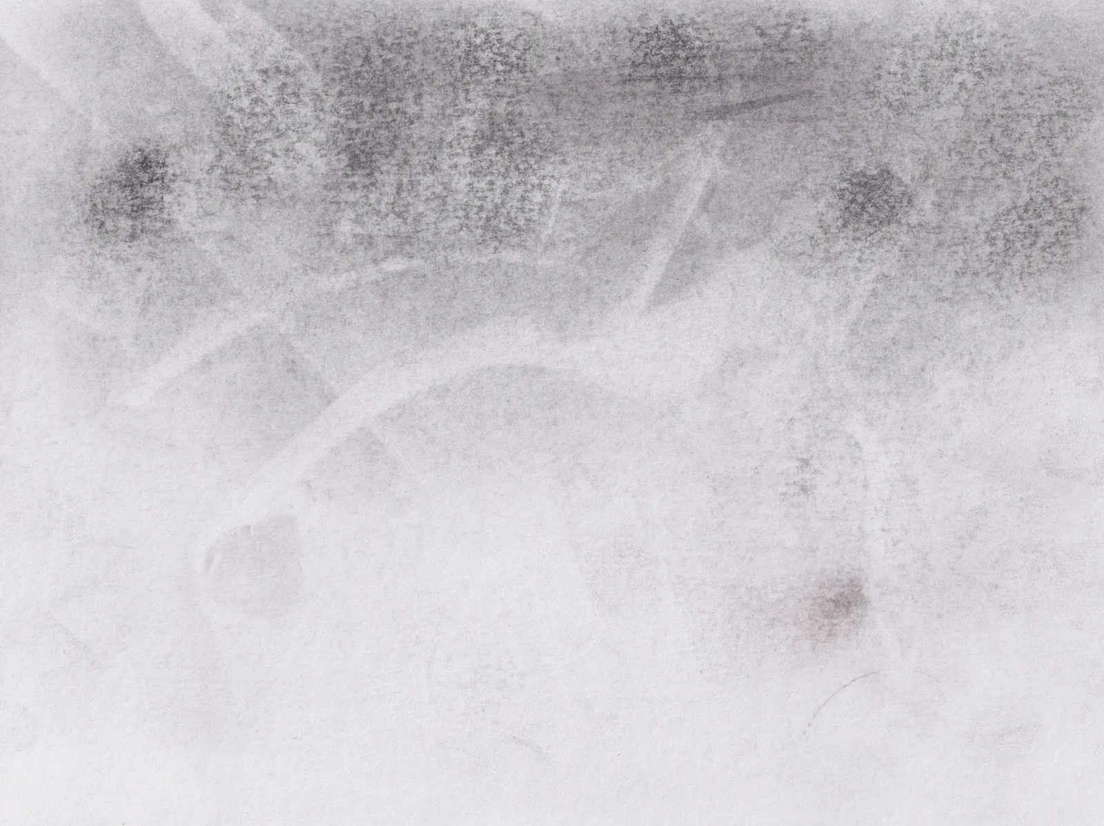 Very pale smudged graphite on white paper, darkening to a grainy band with soft spots along the top